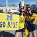 Michigan graduate students Allison Myers and Lizzie Coston,both of Ann Arbor, pose for a photo outside of the Georgia Dome before the start of the Final Four in Atlanta on Saturday, April 6, 2013. Melanie Maxwell I AnnArbor.com